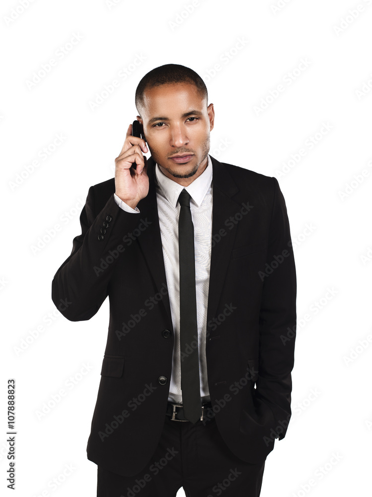 portrait of a businessman talking over the phone. portrait of a businessman talking over the phone.