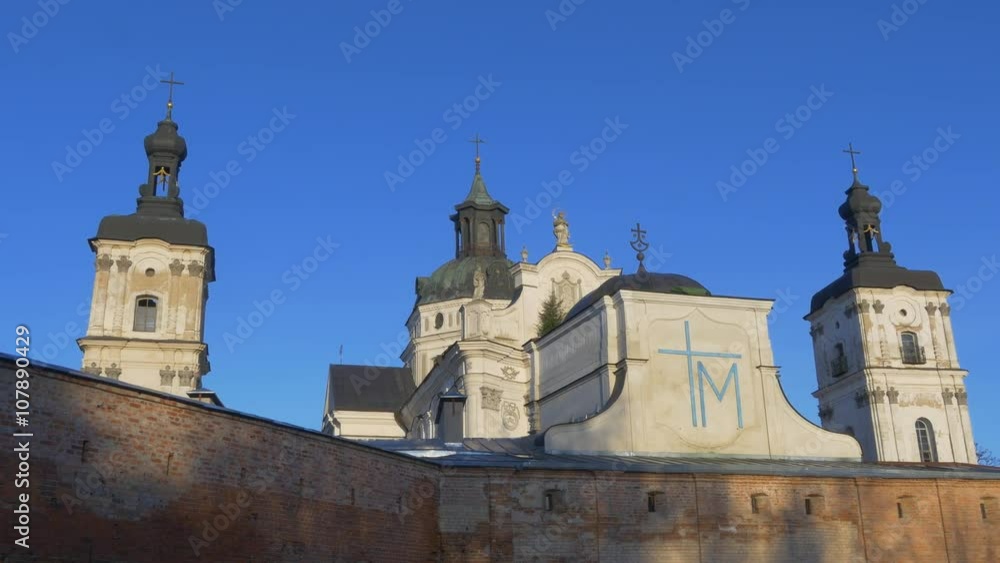 Barefoot Carmelites Monastery Wall and Towers Berdichev Catholic Protective Walls of Church Towers in a Barocco Style Ancient Building Sunny Blue Sky Barefoot Carmelites Monastery Wall and Towers Berdichev Catholic Protective Walls of Church Towers in a Barocco Style Ancient Building Sunny Blue Sky