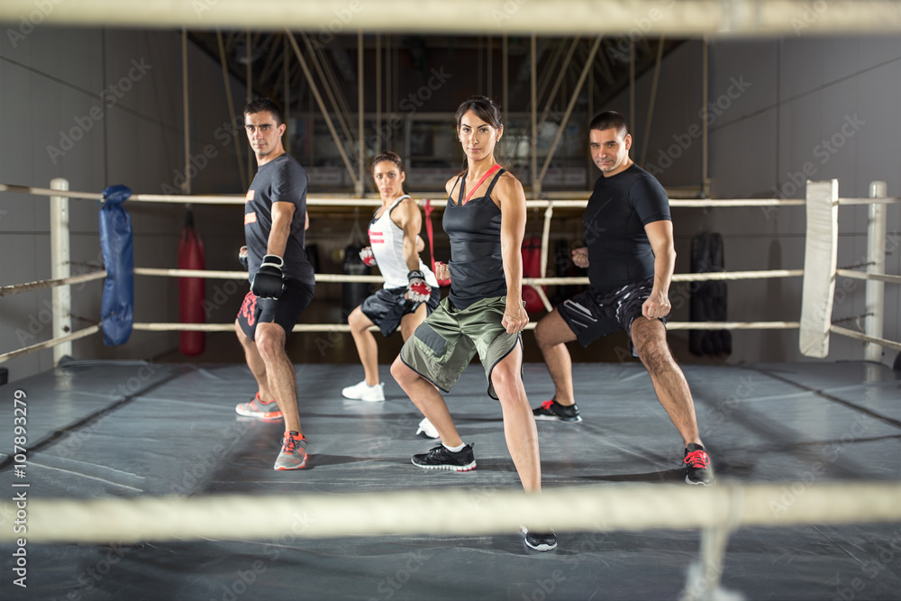 group of people practicing combat.