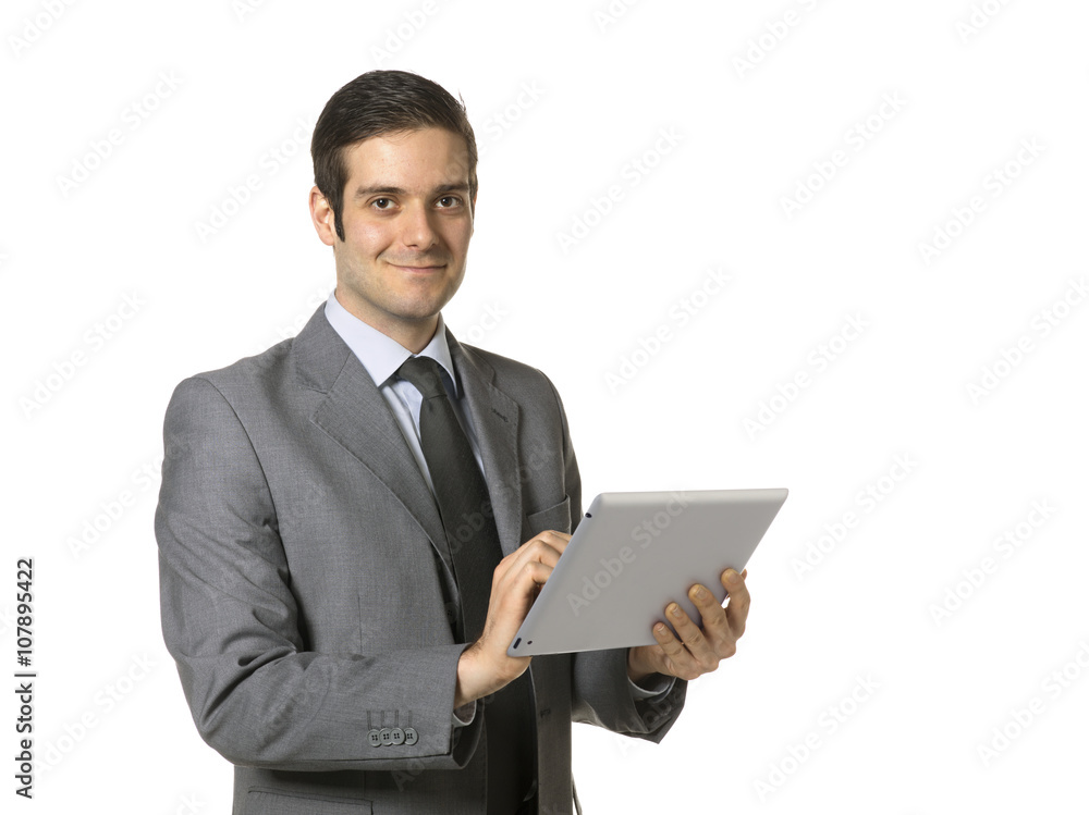 smart young businessman using ipad. smart young businessman using ipad.