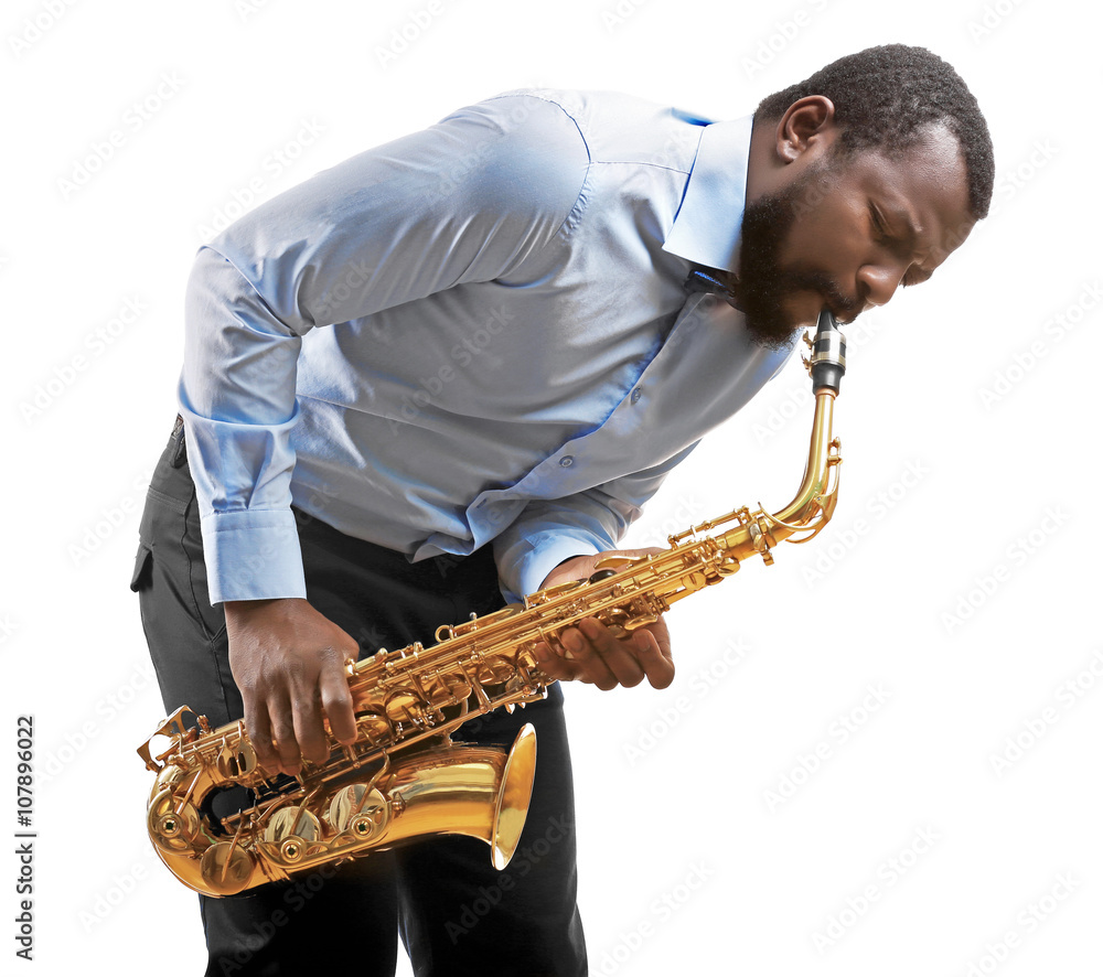 Naklejka premium African American jazz musician playing the saxophone, isolated on white