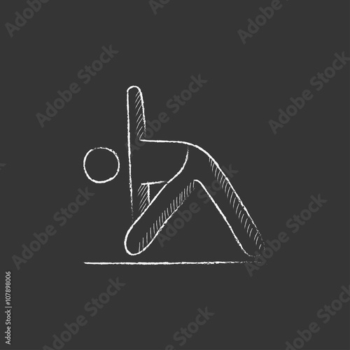 Man practicing yoga. Drawn in chalk icon.