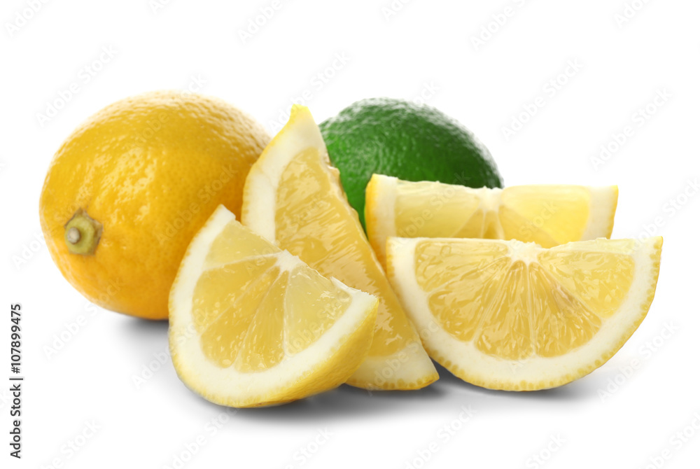 Ripe lime and lemon with slices isolated on white Ripe lime and lemon with slices isolated on white
