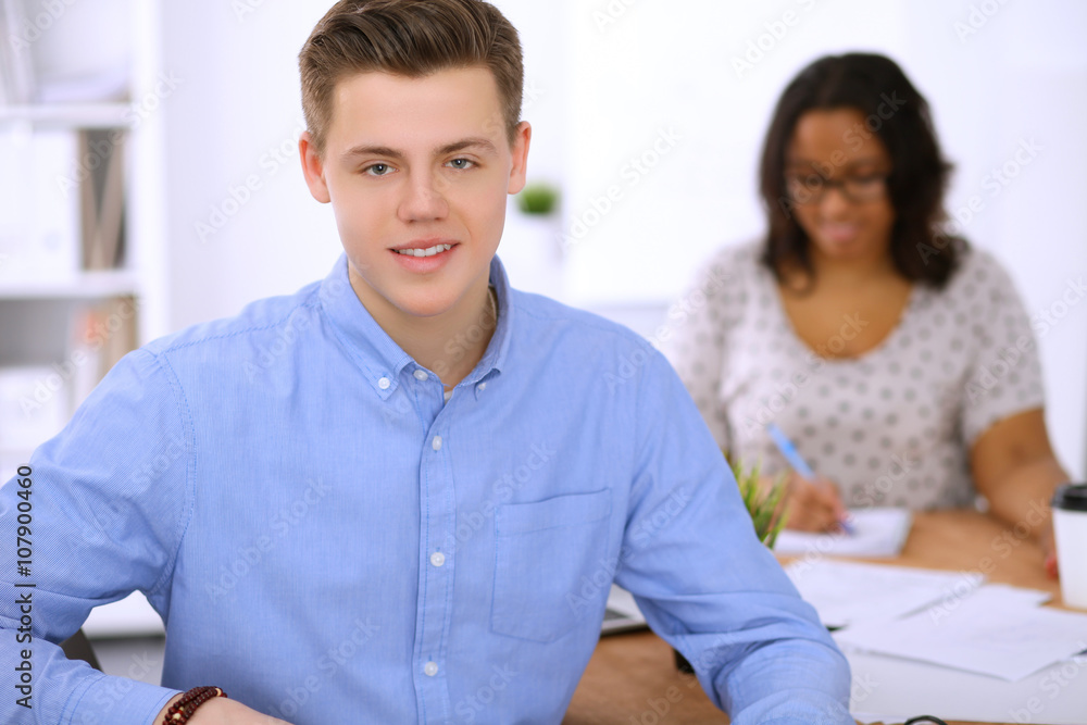 Business people meeting around table, focus on business man. Start up team Business people meeting around table, focus on business man. Start up team