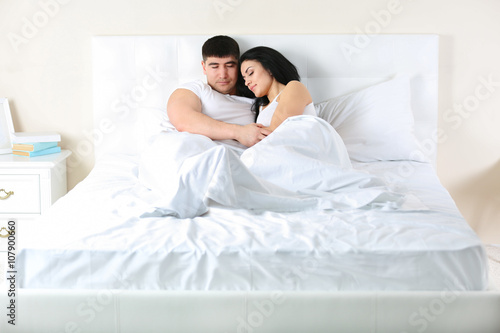 Lovely couple sleeping in w...