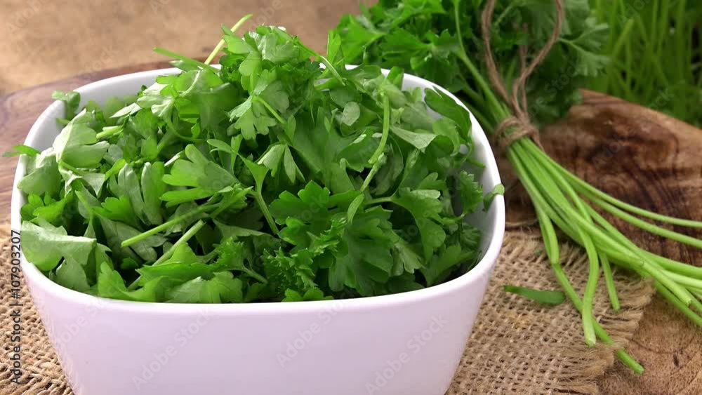 Portion of fresh cutted rotating Parsley as not loopable 4K UHD footage Portion of fresh cutted rotating Parsley as not loopable 4K UHD footage