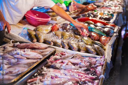 Different kinds of seafood at fish market photo