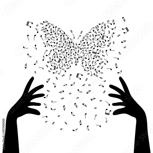 Photography Silhouette of hands are creating the butterfly by note clef