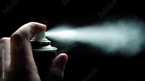 Hand With Spray Can On Black