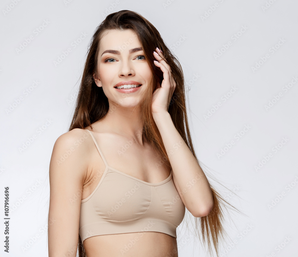 Fototapeta premium Beautiful Woman with Clean Fresh Skin 