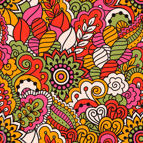 Hand drawn seamless pattern with floral elements. Colorful ethnic background. Pattern can be used for fabric  wallpaper or wrapping
