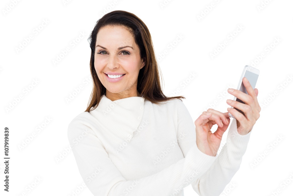 Smiling woman using smartphone Smiling woman using smartphone