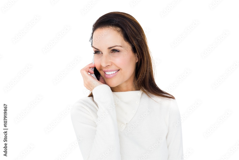 Smiling woman calling with her smartphone Smiling woman calling with her smartphone