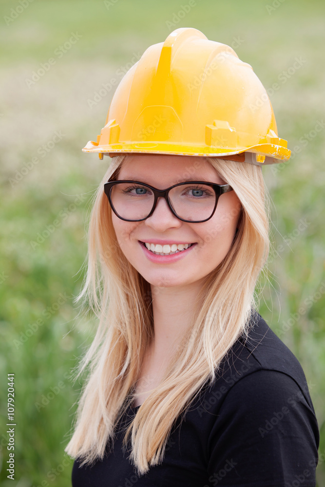 Young architect with yellow helmet Young architect with yellow helmet