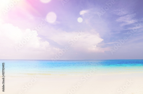cloudy seascape at sunny day with slight lens flare