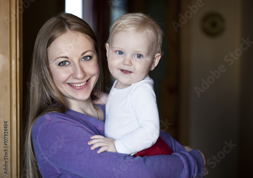 Mother and her little son at home