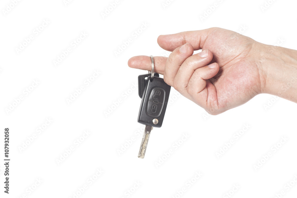 Hand with a car keys isolated on white background Hand with a car keys isolated on white background