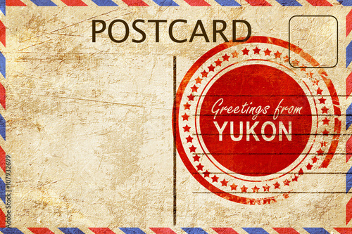 yukon stamp on a vintage, old postcard