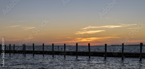 Beautiful sunset in Key Largo  Florida keys  USA  with a dock in the foreground