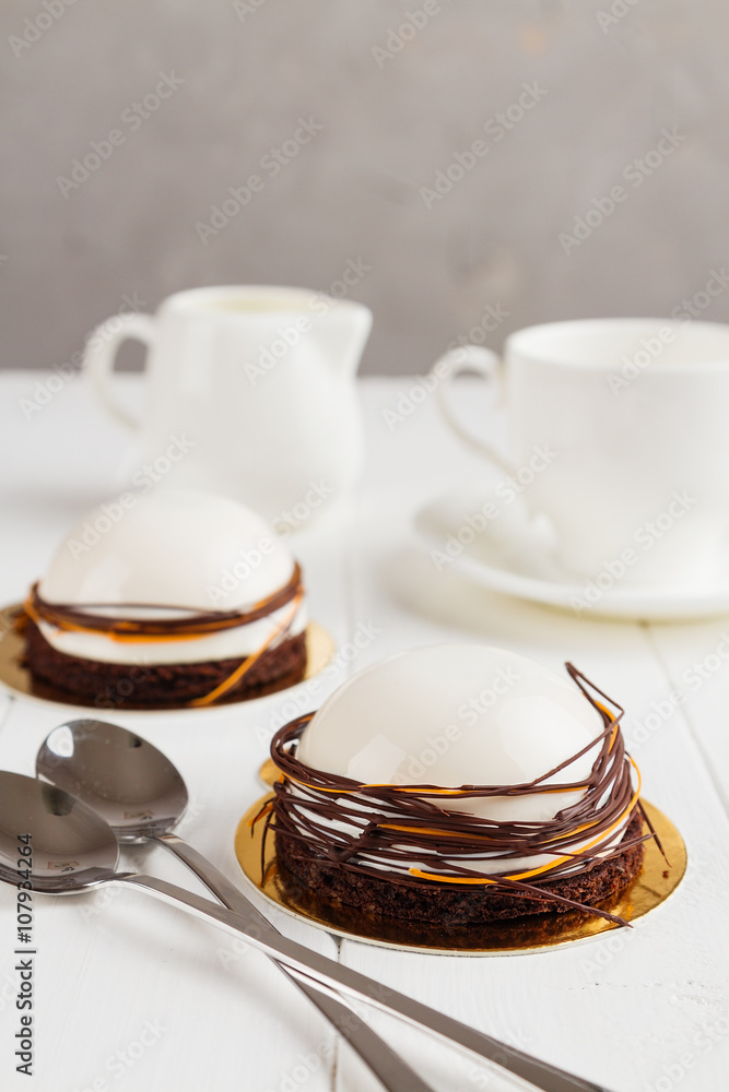 White mousse dessert with mirror glaze White mousse dessert with mirror glaze