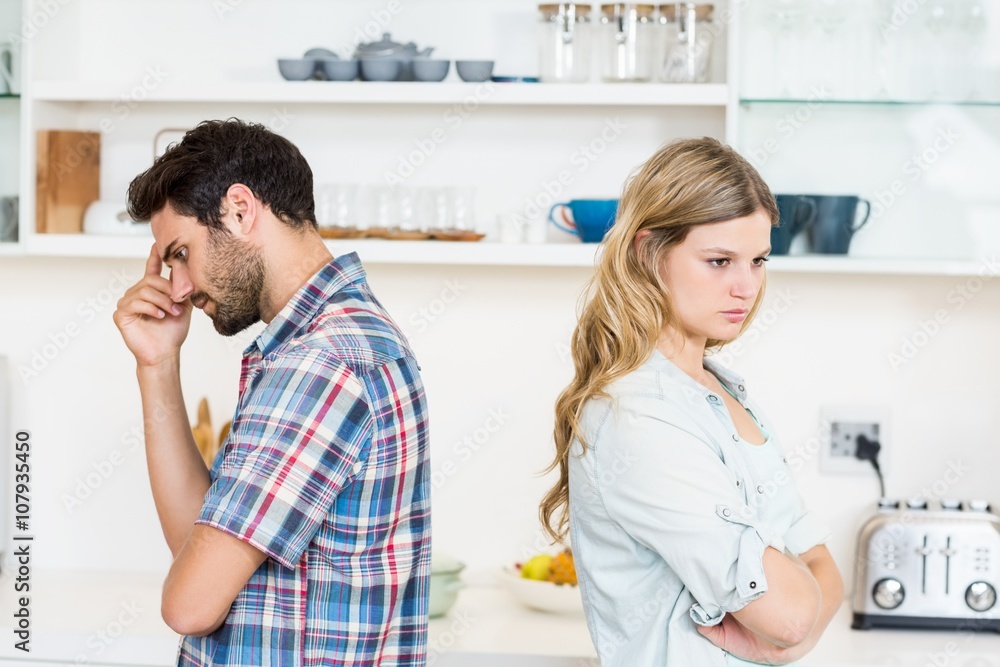 Young couple ignoring each other