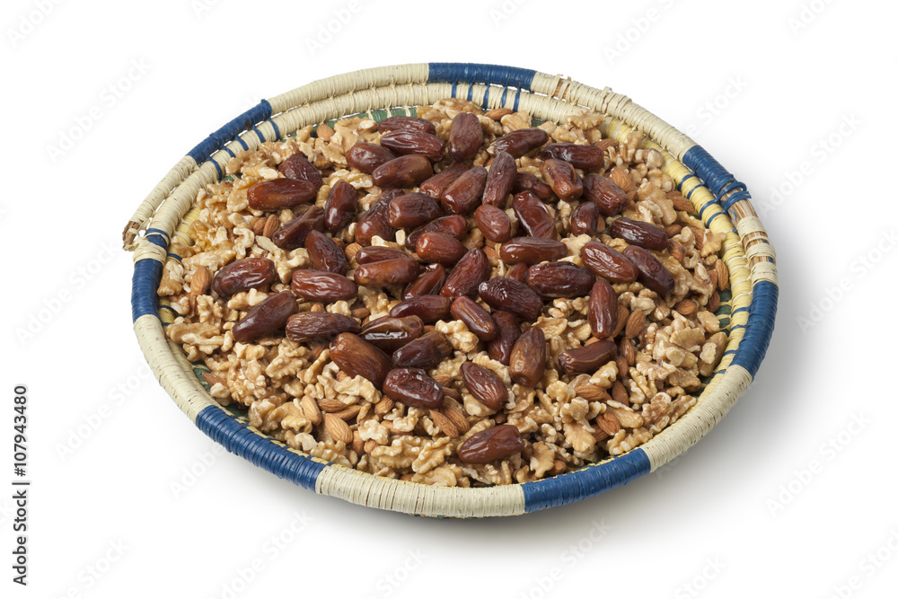 Moroccan festive basket with nuts and dates Moroccan festive basket with nuts and dates