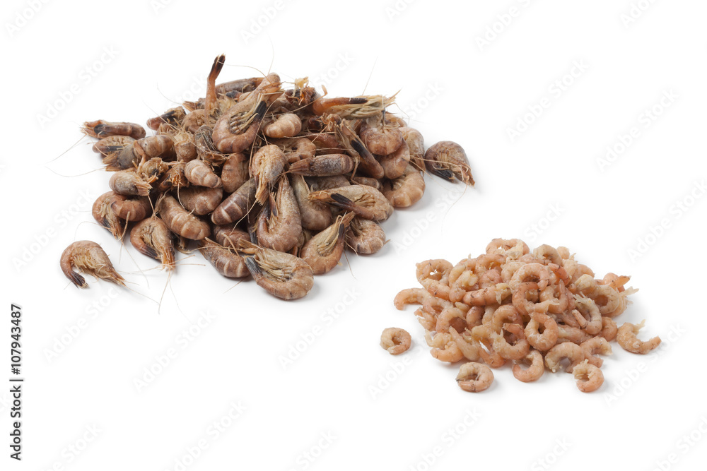 Fototapeta premium Heap of peeled and unpeeled brown shrimps