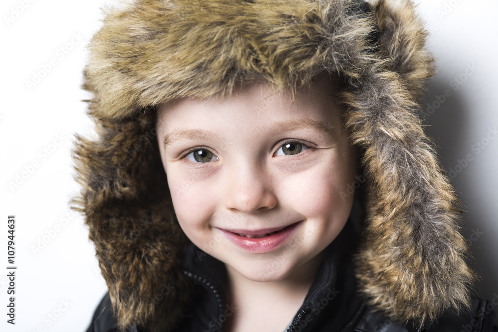 child in fur Hat fashion casual winter style little boy child in fur Hat fashion casual winter style little boy