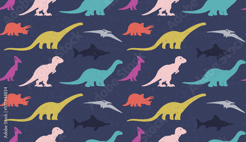 Fototapeta Naklejka Na Ścianę i Meble -  Dinosaurs silhouettes on white background. Seamless pattern