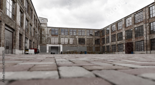 Obraz na płótnie Ground level view of old warehouse exterior w salonie