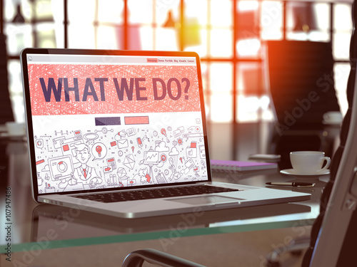 Tableau sur toile What We Do Concept - Closeup on Landing Page of Laptop Screen in Modern Office Workplace