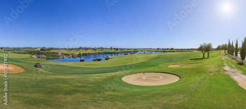 Panorama of a golf course on sunny day. 