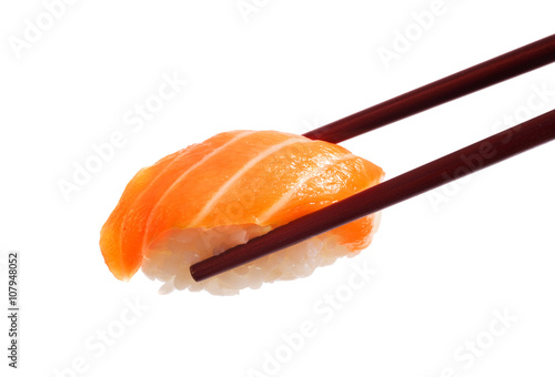Sushi with chopsticks on white background