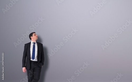 Handsome businessman leaning