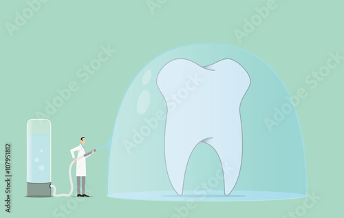 Dentist covers a tooth with protective paste.
