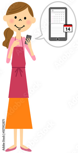 スマートフォンを触るエプロンの女性 