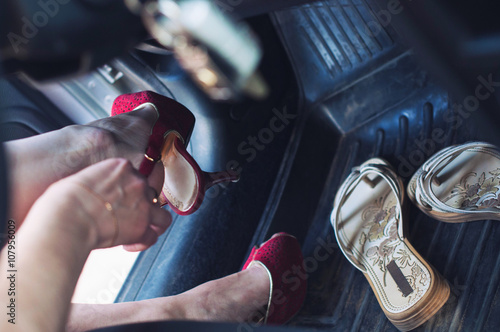 high heel in the car photo