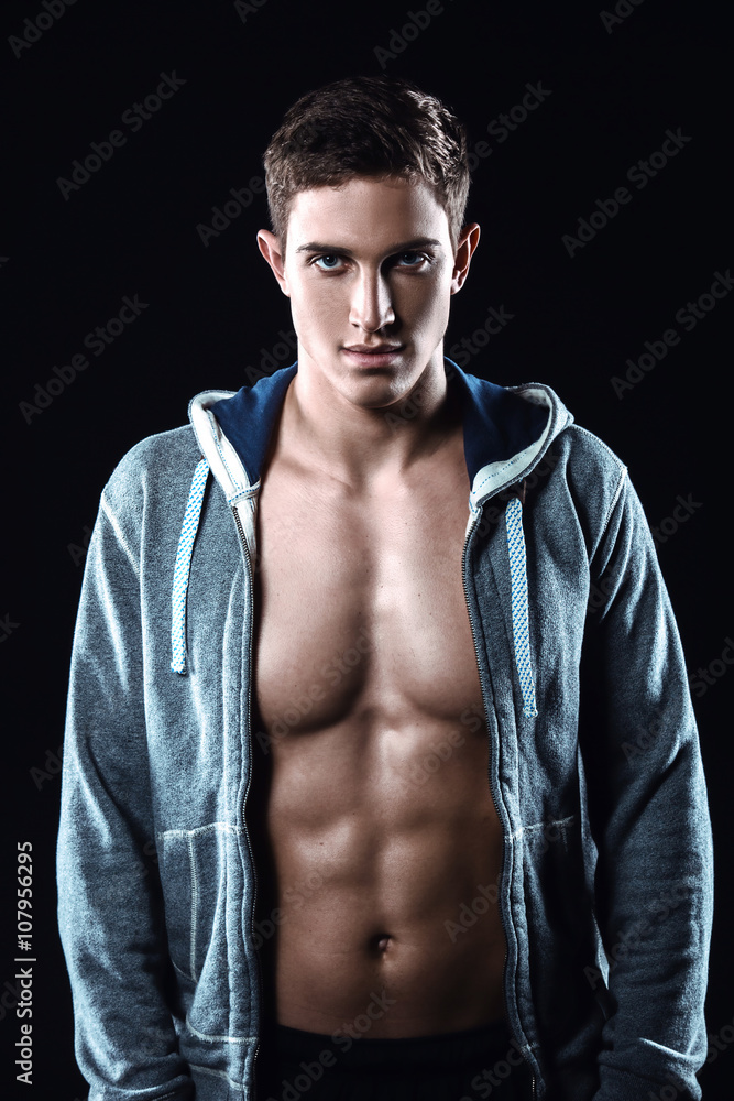 Fitness boy on black background Fitness boy on black background