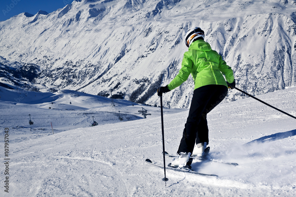 young woman is enjoying winter sports in Austrian Alps young woman is enjoying winter sports in Austrian Alps