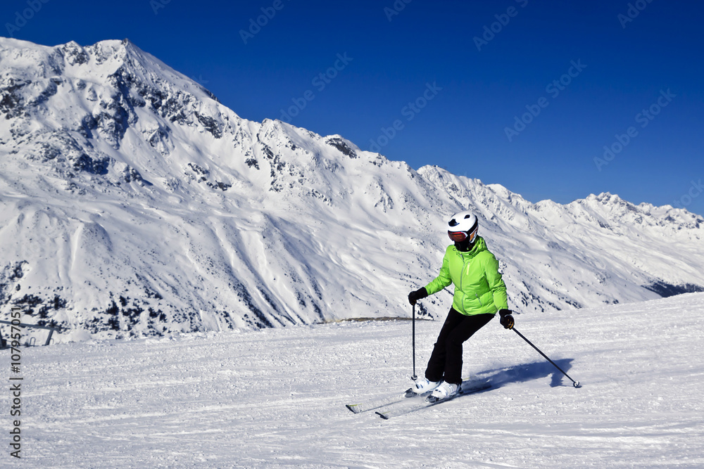 young woman is enjoying winter sports in Austrian Alps young woman is enjoying winter sports in Austrian Alps
