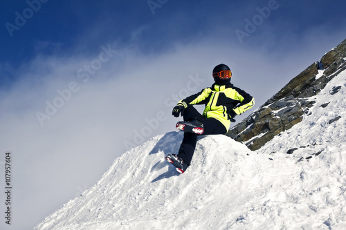 young man enjoying winter skiing