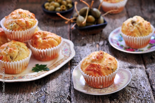 snack cakes with cheese, ham, olives and sun-dried tomatoes