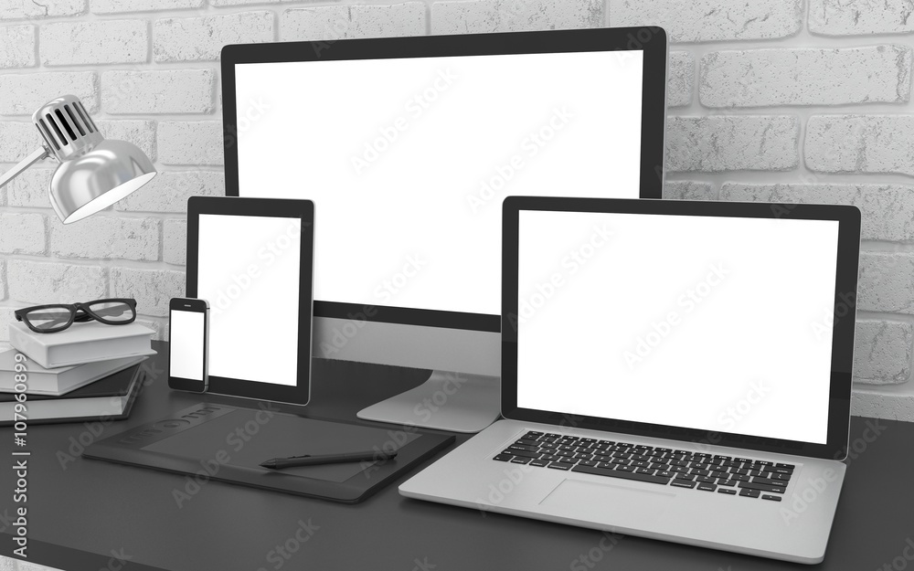 Responsive mockup screen. Monitor, laptop, tablet, phone on table in office. 3d rendering. Responsive mockup screen. Monitor, laptop, tablet, phone on table in office. 3d rendering.