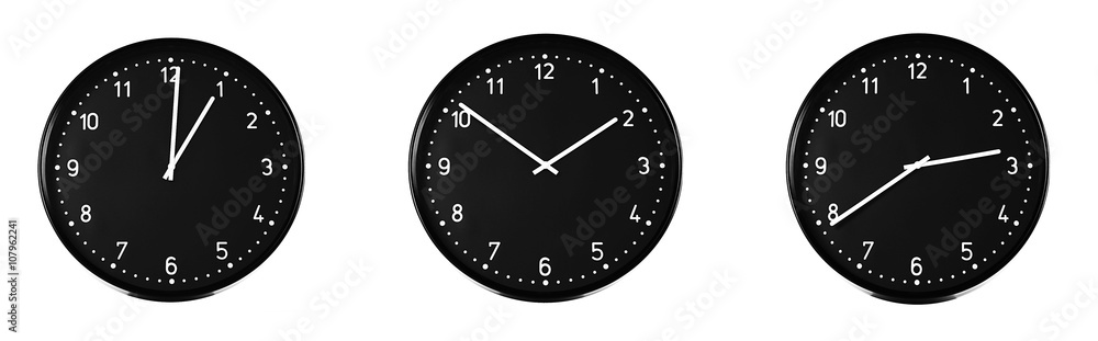 Collage of round wall clocks, isolated on white Collage of round wall clocks, isolated on white