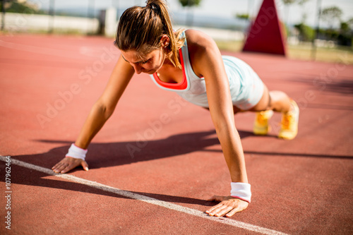 Young woman taking exercise