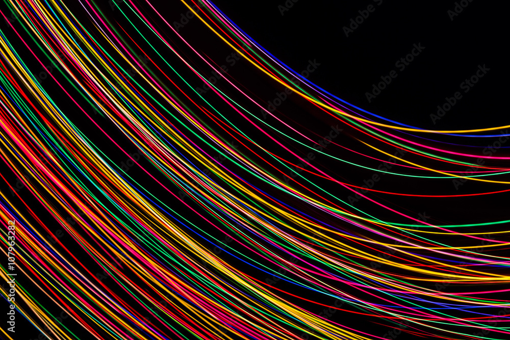Neon lights in motion. Abstract colorful shiny background. Neon lights in motion. Abstract colorful shiny background.