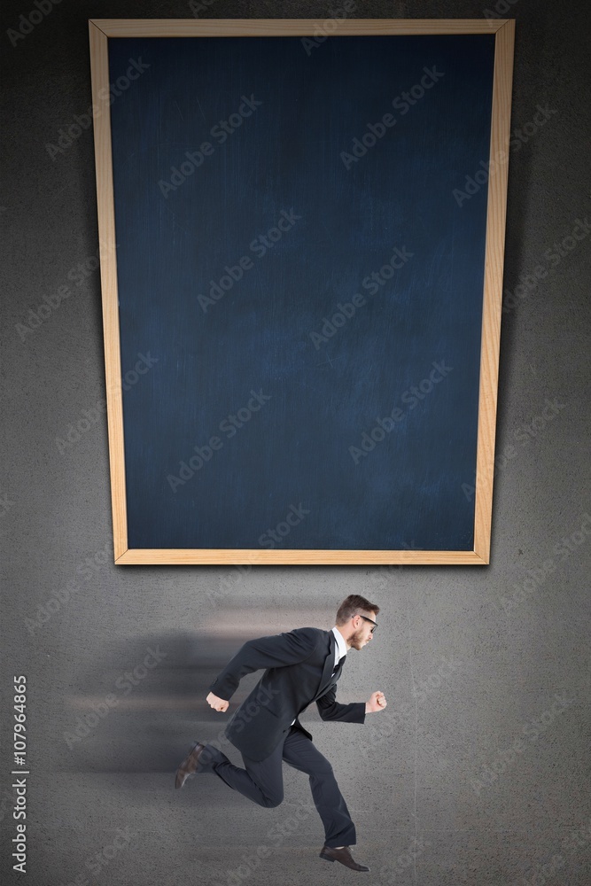 Geeky young businessman running mid air Geeky young businessman running mid air