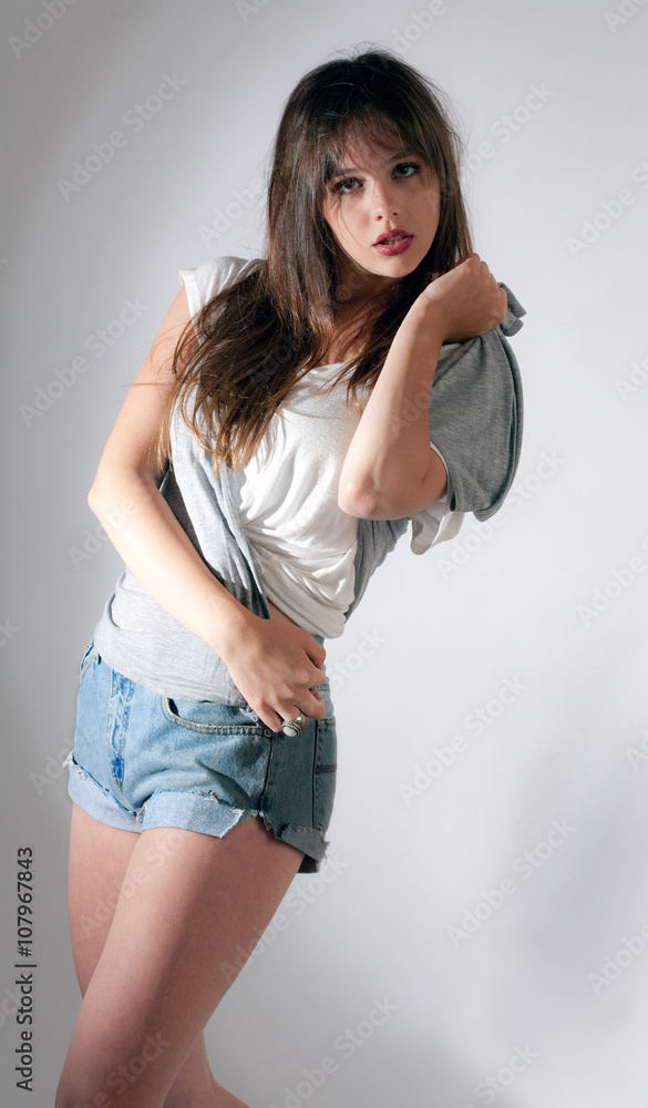 Teen Model in Jean Shorts and T-Shirt Photos | Adobe Stock