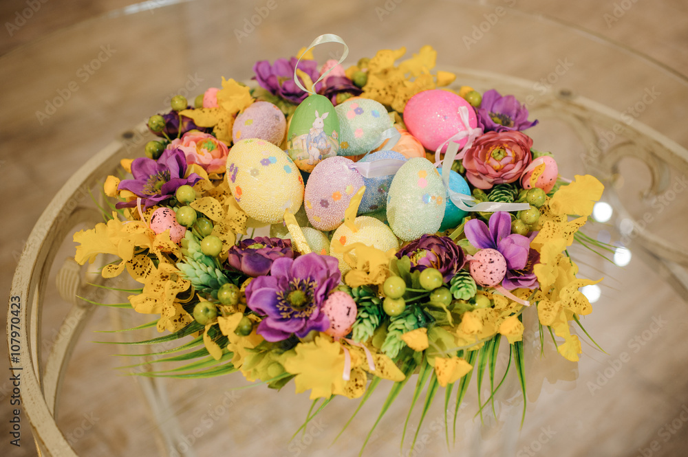 Easter table decoration with flowers and eggs Easter table decoration with flowers and eggs