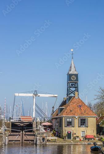 Little lock and lockhouse in historical Hindeloopen photo